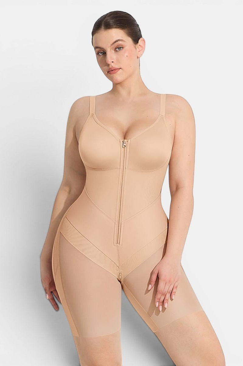 www.modusactive.com nude full-bust bodysuit with zipper front, mesh panels on thighs, and adjustable straps.