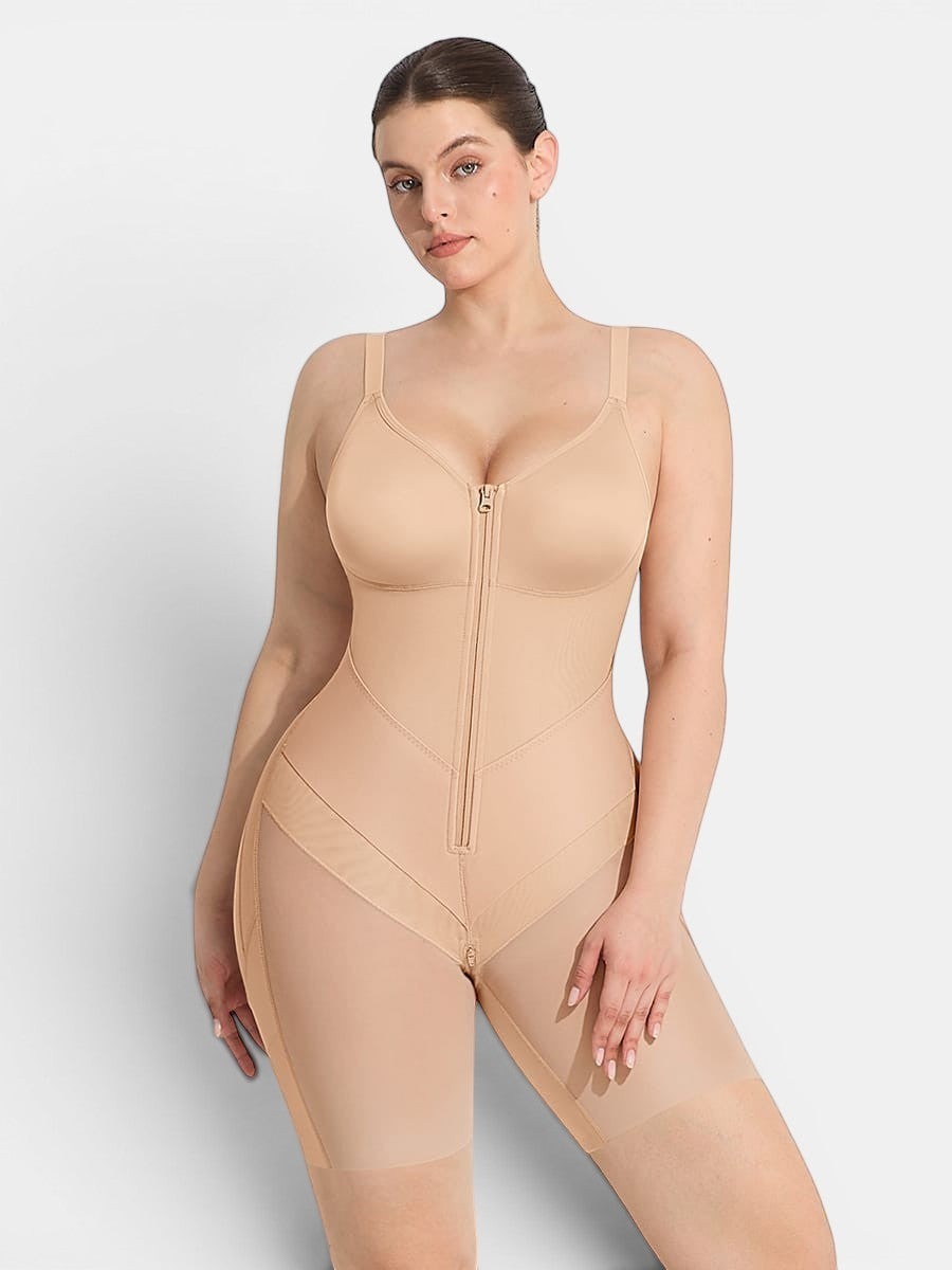 www.modusactive.com nude full-bust bodysuit with zipper front, mesh panels on thighs, and adjustable straps.