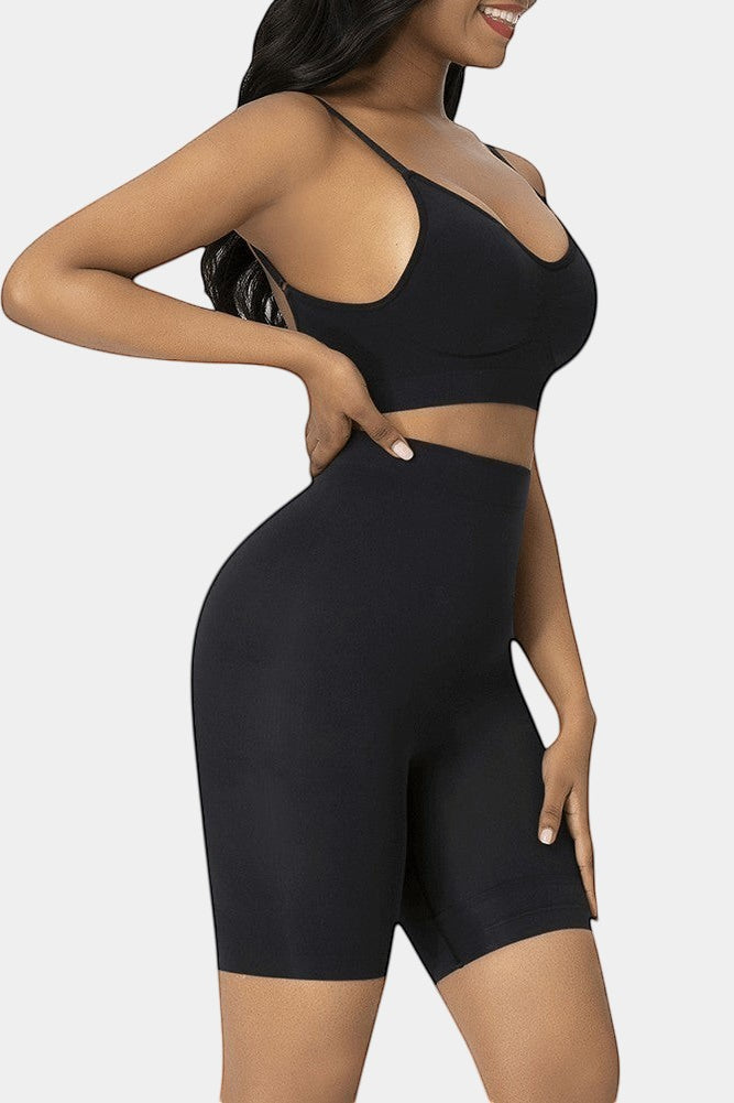 www.modusactive.com black seamless high-waist butt lifter shorts made of nylon and elastane for tummy control and shaping.