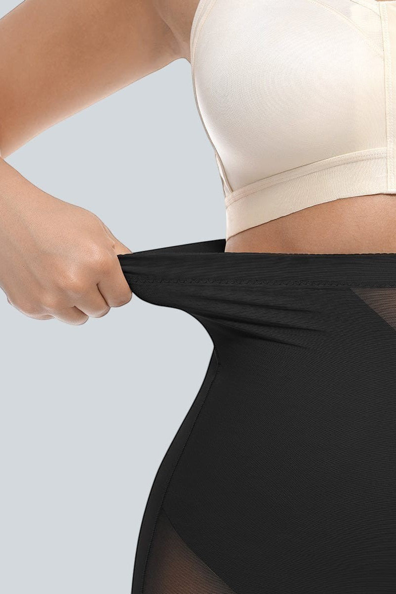 www.modusactive.com black high-waisted shaping shorts with mesh panels and tummy control