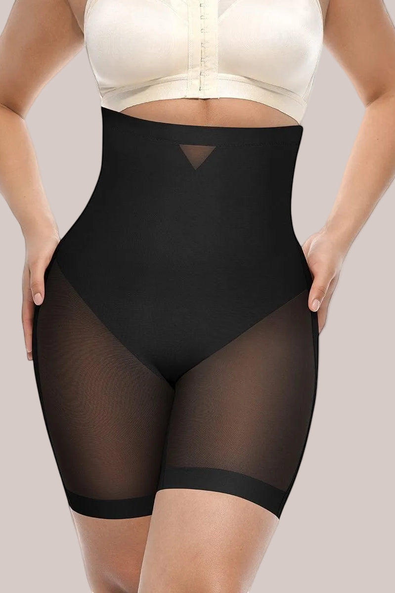 www.modusactive.com black high-waisted shaping shorts with mesh panels on hips and legs, tummy control, and butt-lifting design.