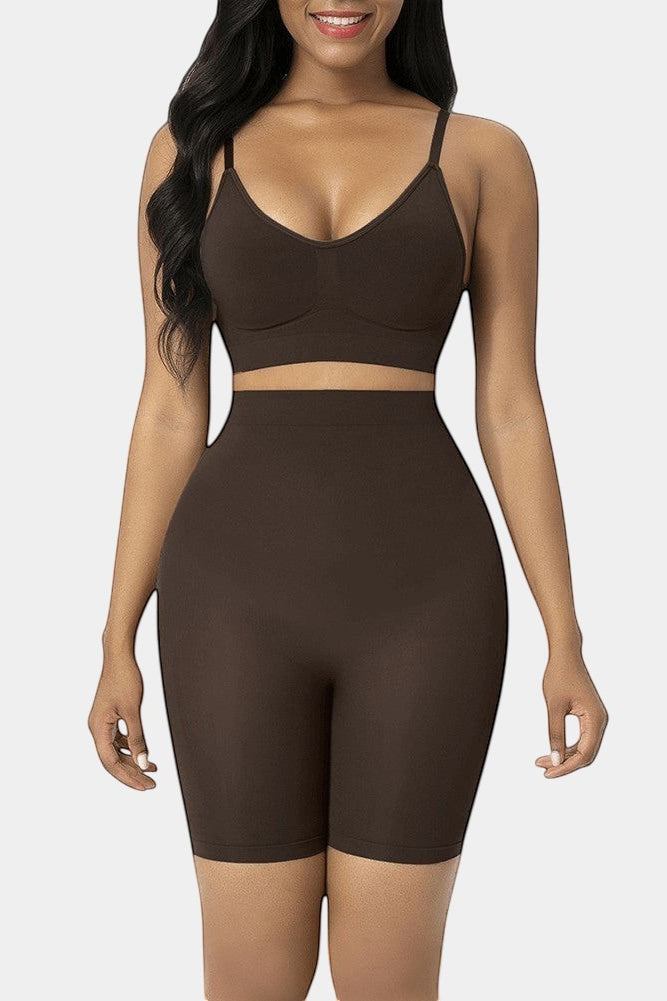 Modusactive brown seamless high-waist butt lifter shorts made of nylon and elastane for tummy control and slimming effect.