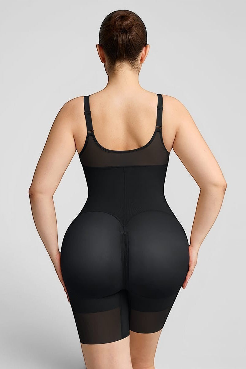 www.modusactive.com black nylon and spandex full-bust bodysuit with adjustable straps and seamless leg openings.
