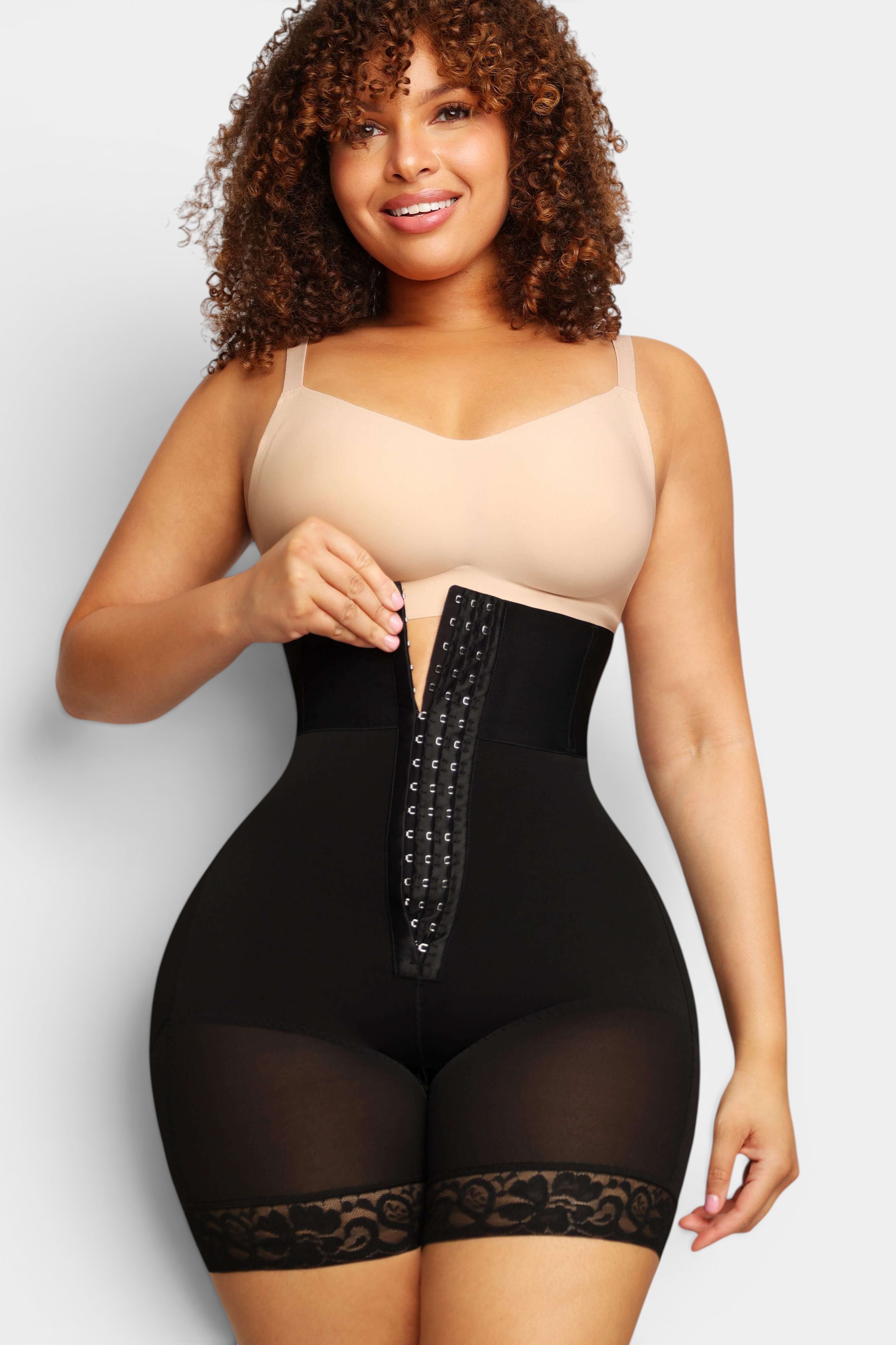 MODUS Sculpt™ black high-waist bodysuit with triple-closure front, lace trim, and tummy control. Made of nylon and spandex.