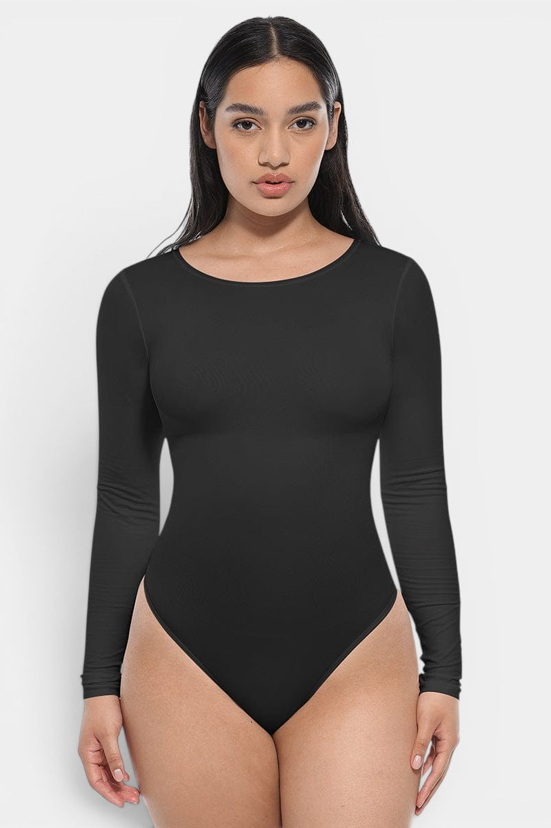 www.modusactive.com black long sleeve bodysuit with tummy and arm slimming features, made of nylon and spandex.