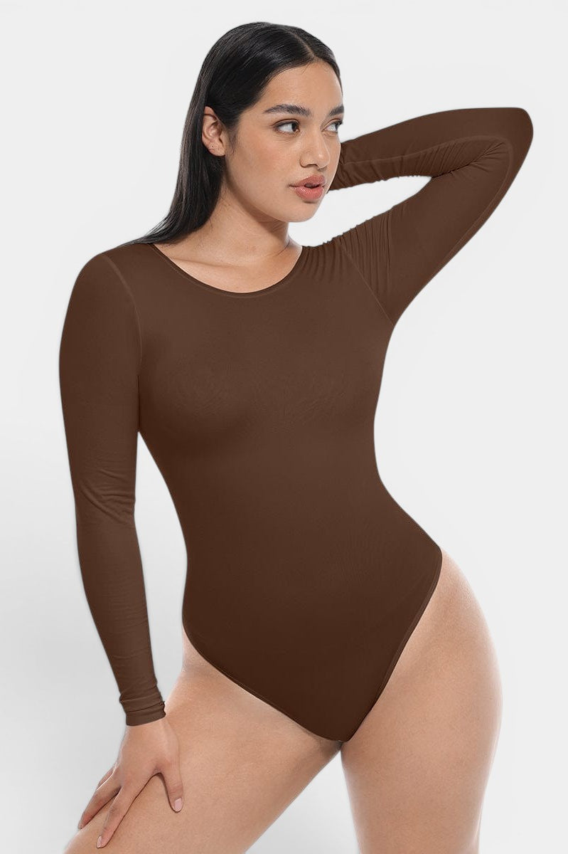 www.modusactive.com Sculpt™ long sleeve bodysuit in brown, made of nylon and spandex, with tummy and arm control.