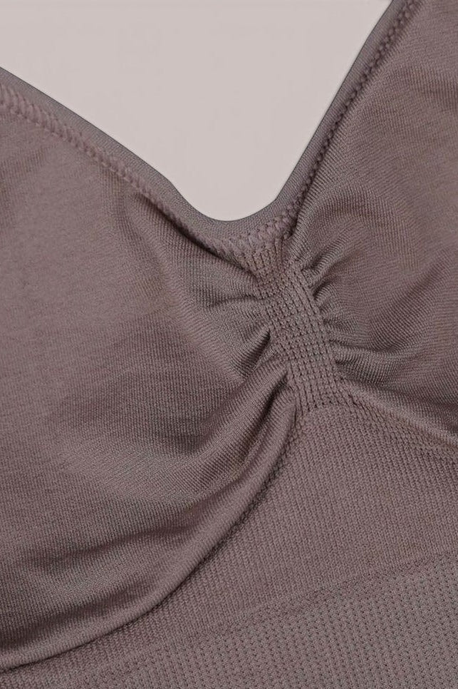 MODUS Sculpt Contour Bra in taupe, made of nylon and elastane, featuring seamless technology and adjustable straps.