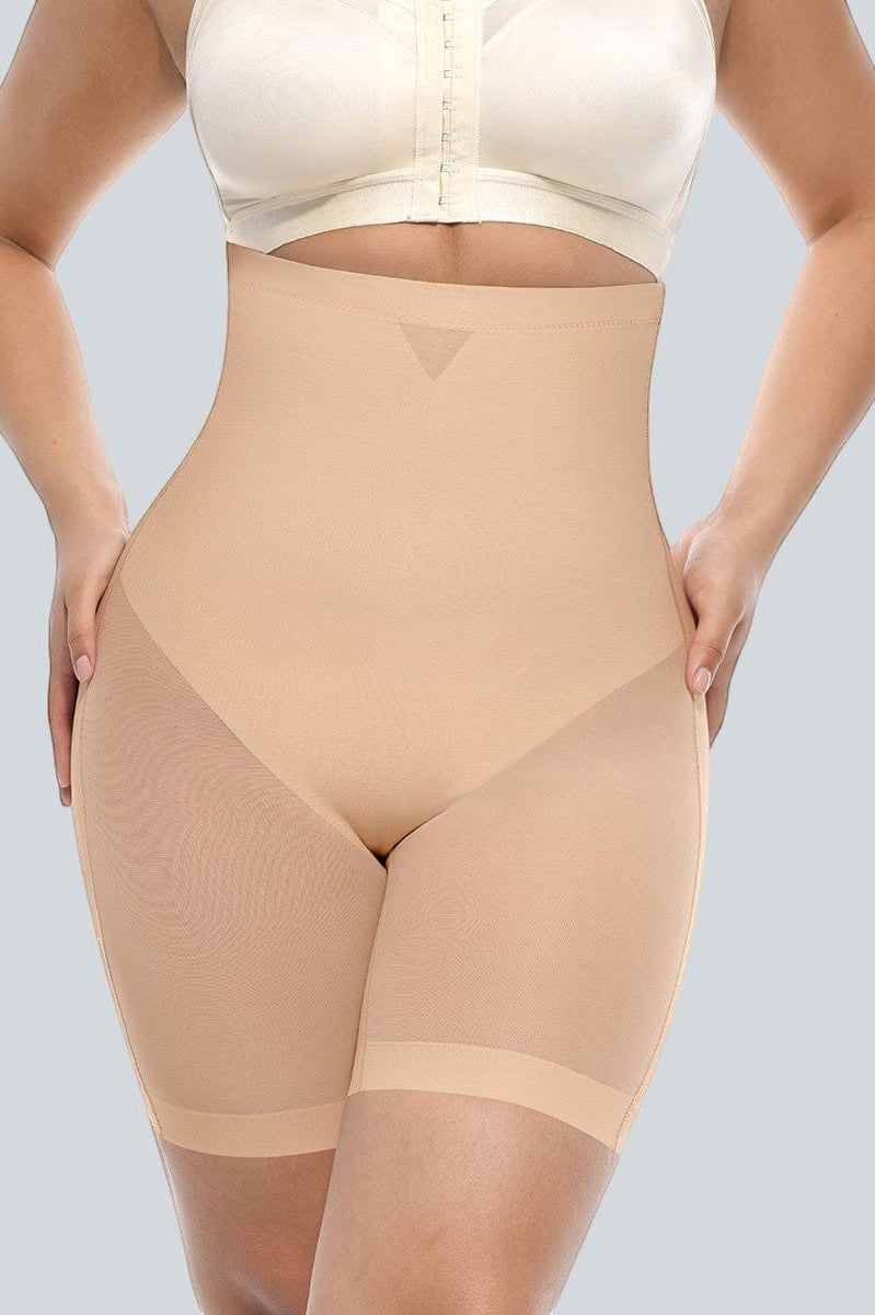 www.modusactive.com nude high-waisted shaping shorts with mesh hip panels and seamless bonded edges.