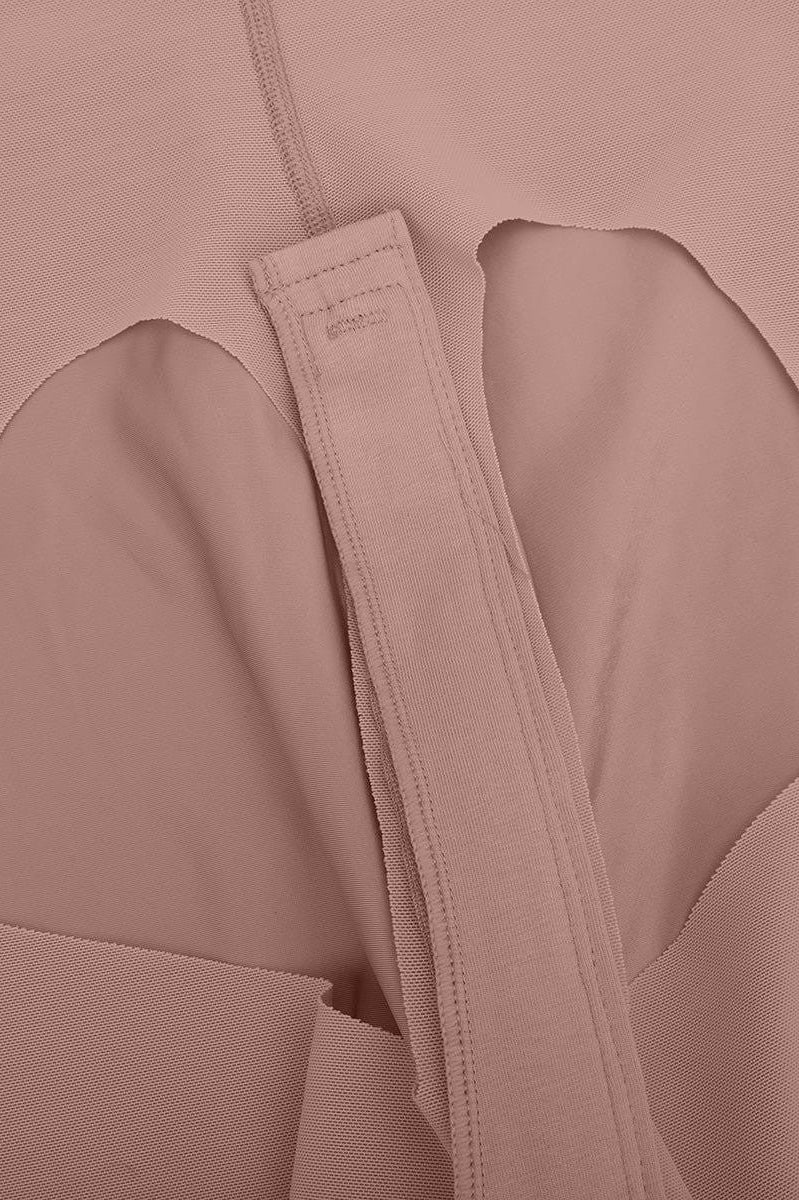 www.modusactive.com dusty rose high-waisted shaping shorts with a wide elastic waistband and seamless leg openings.