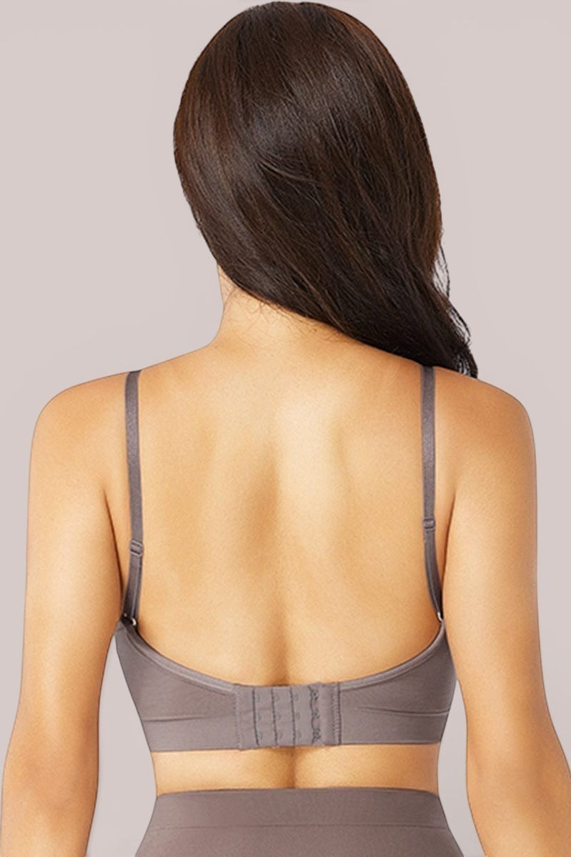 www.modusactive.com Sculpt Contour Bra in grey, seamless nylon and elastane blend with adjustable straps and hook-and-eye closure.