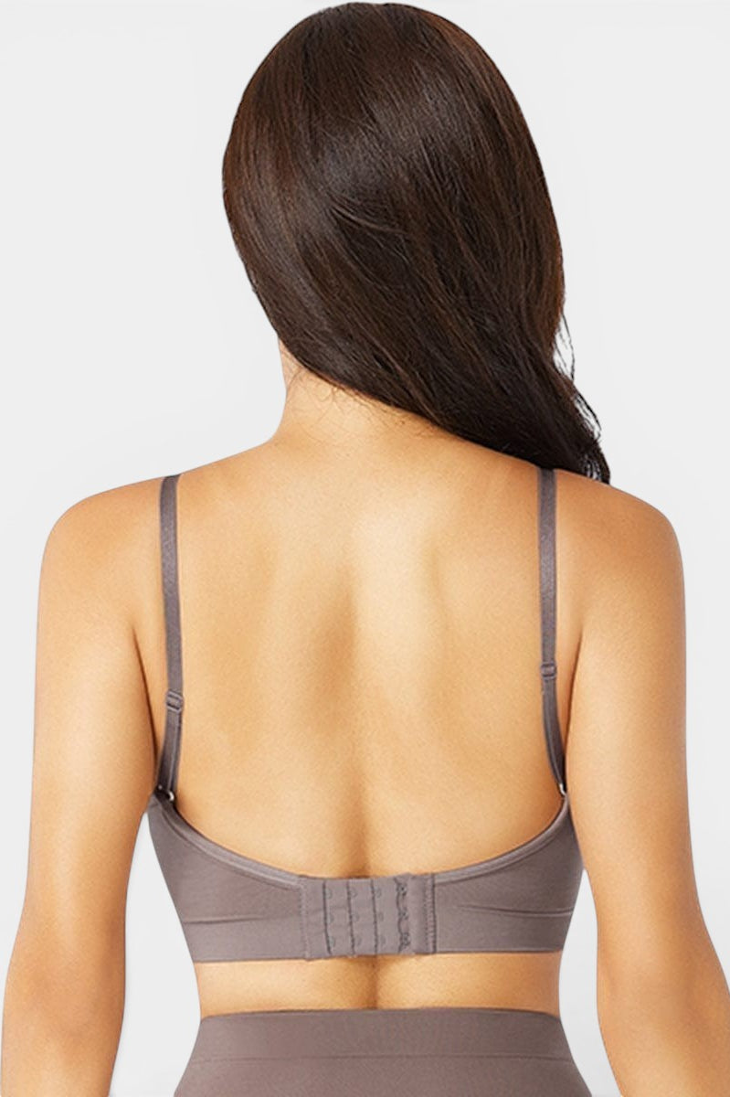 www.modusactive.com Sculpt Contour Bra in grey, seamless nylon and elastane blend with adjustable straps and hook-and-eye closure.