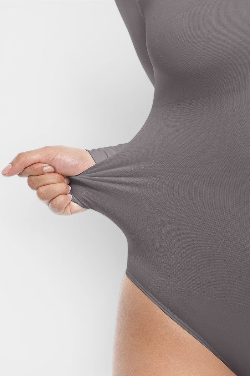 www.modusactive.com Sculpt Long Sleeve Bodysuit in grey nylon and spandex blend with tummy and arm control.