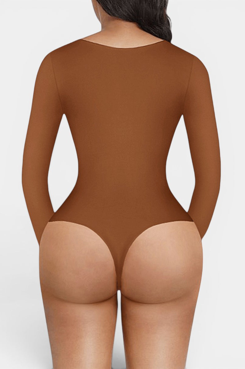 www.modusactive.com Sculpt V-Neck Bodysuit in brown, made of nylon and spandex, with long sleeves and thong back.