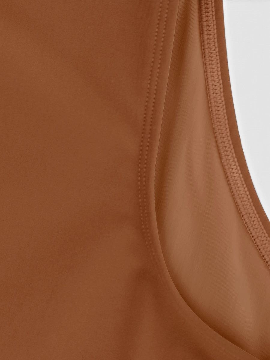 www.modusactive.com Sculpt V-Neck Bodysuit in brown nylon and spandex blend with a figure-hugging fit and thong styling.