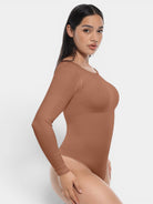 MODUS Sculpt™ Long Sleeve Bodysuit in brown, made of nylon and spandex, features tummy and arm slimming.