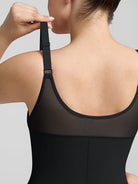 www.modusactive.com black nylon-spandex full-bust bodysuit with mesh back panel and adjustable straps.