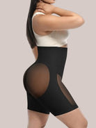 www.modusactive.com black high-waisted shaping shorts with mesh panels on hips and legs, tummy control and butt lift.