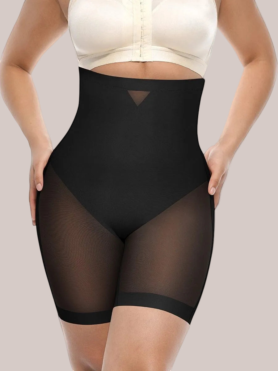 www.modusactive.com black high-waisted shaping shorts with mesh panels on hips and legs, tummy control, and butt-lifting design.