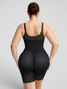 www.modusactive.com black nylon and spandex full-bust bodysuit with adjustable straps and seamless leg openings.
