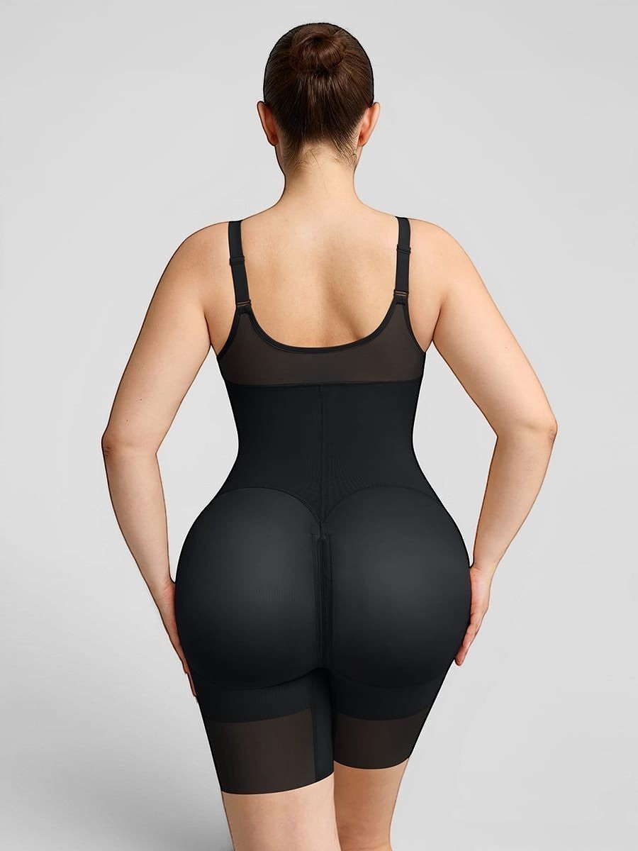 www.modusactive.com black nylon and spandex full-bust bodysuit with adjustable straps and seamless leg openings.