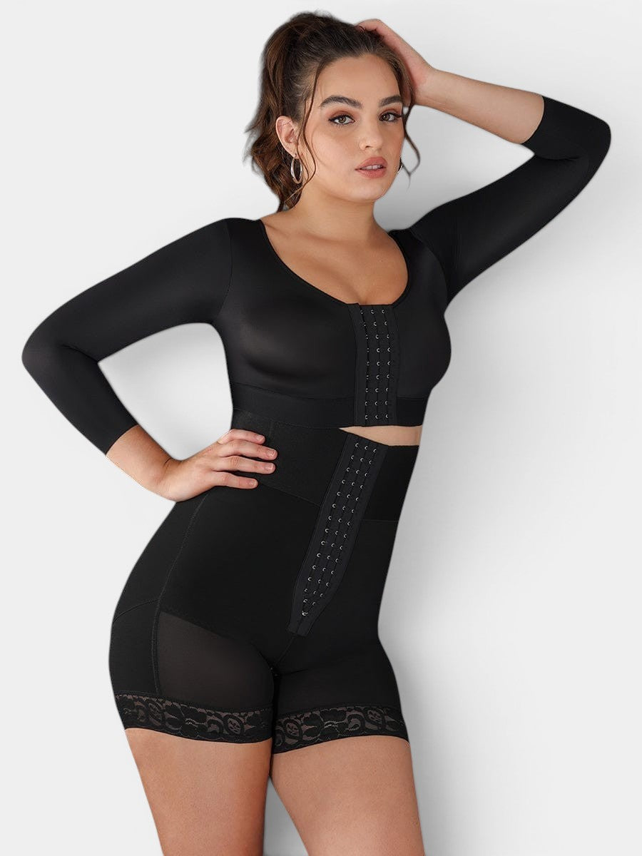 Black long-sleeve MODUS Sculpt™ Triple-Closure Bodysuit with high waist, tummy control, and lace trim. Model is wearing a size XL.