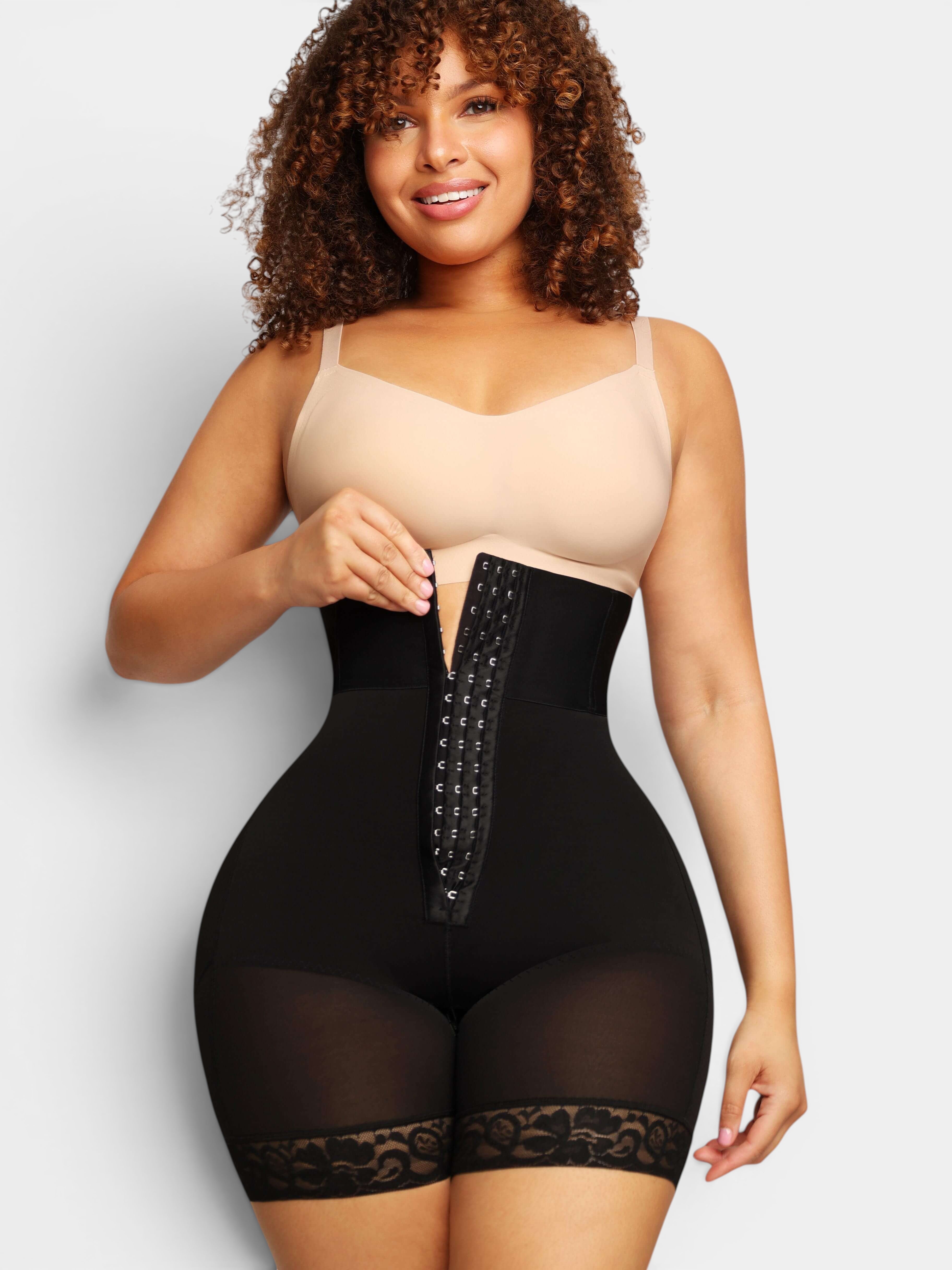 MODUS Sculpt™ black high-waist bodysuit with triple-closure front, lace trim, and tummy control. Made of nylon and spandex.