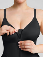 www.modusactive.com black full-bust bodysuit with zipper closure and adjustable straps, made of nylon and spandex.