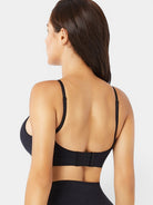 MODUS Sculpt Contour Bra in black, featuring adjustable straps and seamless technology. Made from 90% nylon and 10% spandex.