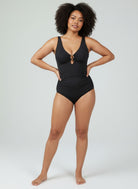 www.modusactive.com black ruched V-neck one-piece swimsuit with gold ring detail and wide straps.