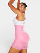 www.modusactive.com pink high-waisted bodysuit with triple closure, tummy control, and butt lift features. Made of nylon and spandex with lace trim.