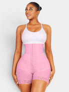 www.modusactive.com pink high-waist bodysuit with triple closure, tummy control, and lace trim on legs. Nylon/spandex blend.
