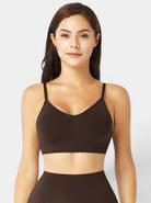 www.modusactive.com Sculpt Contour Bra in dark brown, made of nylon and elastane, with removable padding and adjustable straps.