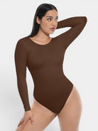 www.modusactive.com Sculpt™ long sleeve bodysuit in brown, made of nylon and spandex, with tummy and arm control.