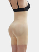 www.modusactive.com beige high-waisted shaping shorts with tummy control and seamless design, made of nylon and spandex.
