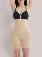 www.modusactive.com beige high-waisted shaping shorts made of nylon and spandex with seamless design and 3 buckle closures.
