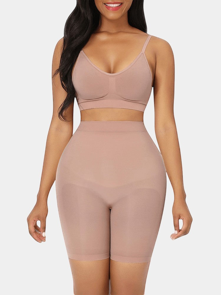 Nude seamless high-waist butt lifter shorts made of nylon and elastane. Invisible under clothing, flattens stomach.