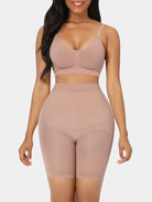 Nude seamless high-waist butt lifter shorts made of nylon and elastane. Invisible under clothing, flattens stomach.