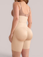 www.modusactive.com beige high-waisted shaping shorts with butt lifting feature and zipper closure.