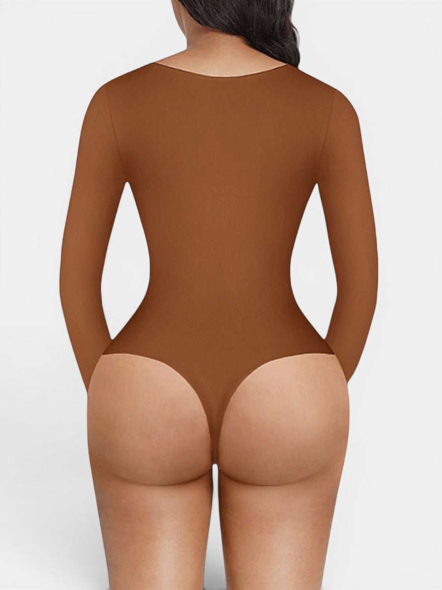 www.modusactive.com Sculpt V-Neck Bodysuit in brown, made of nylon and spandex, with long sleeves and thong back.