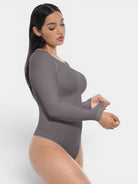 www.modusactive.com Sculpt Long Sleeve Bodysuit in grey nylon and spandex with tummy and arm control.